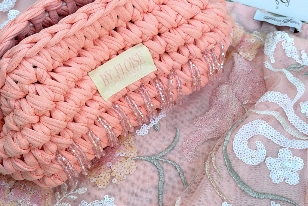 Peach beaded clutch